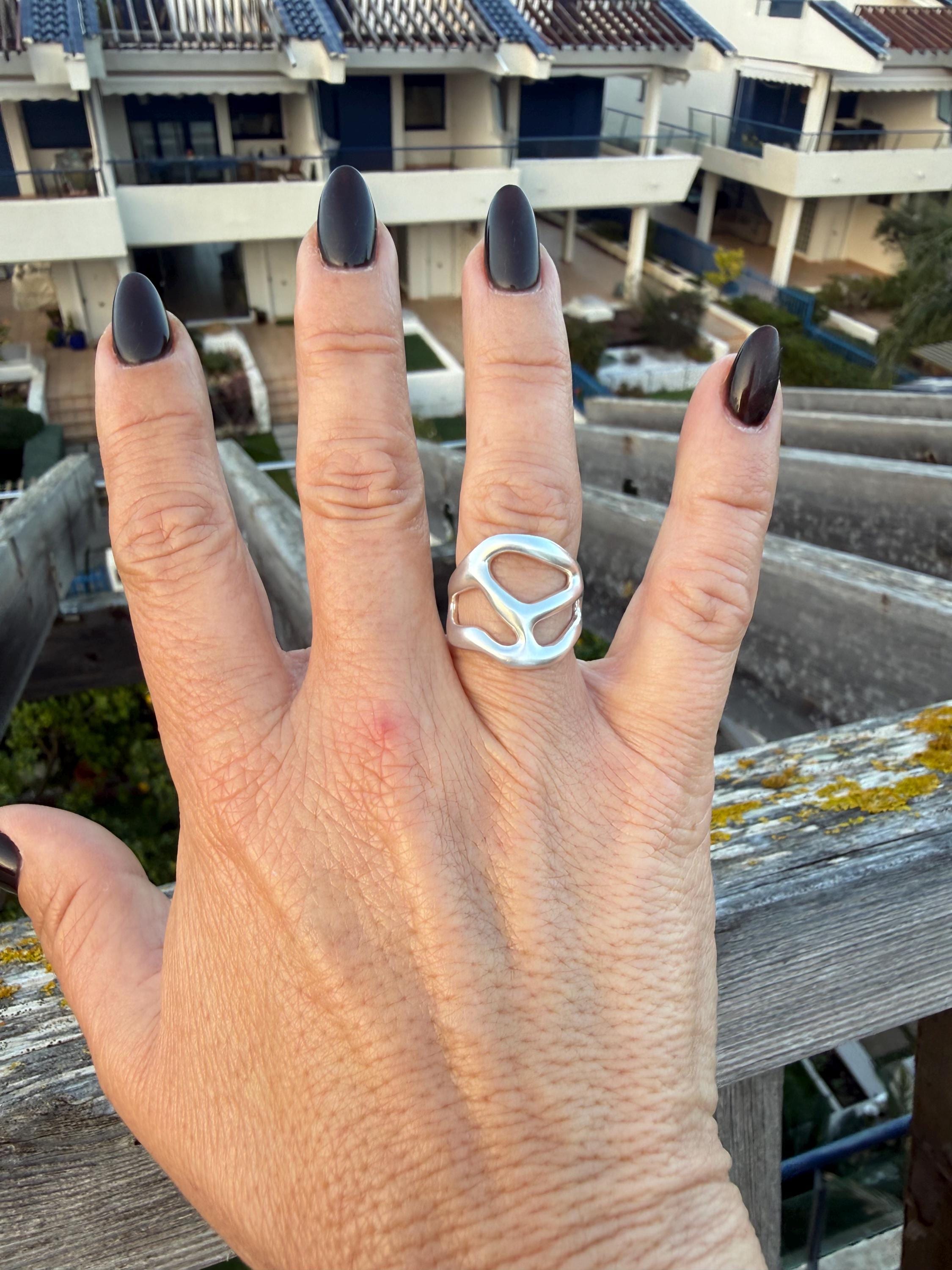 Artisian silver plated carved ring with open band design and bohemian style