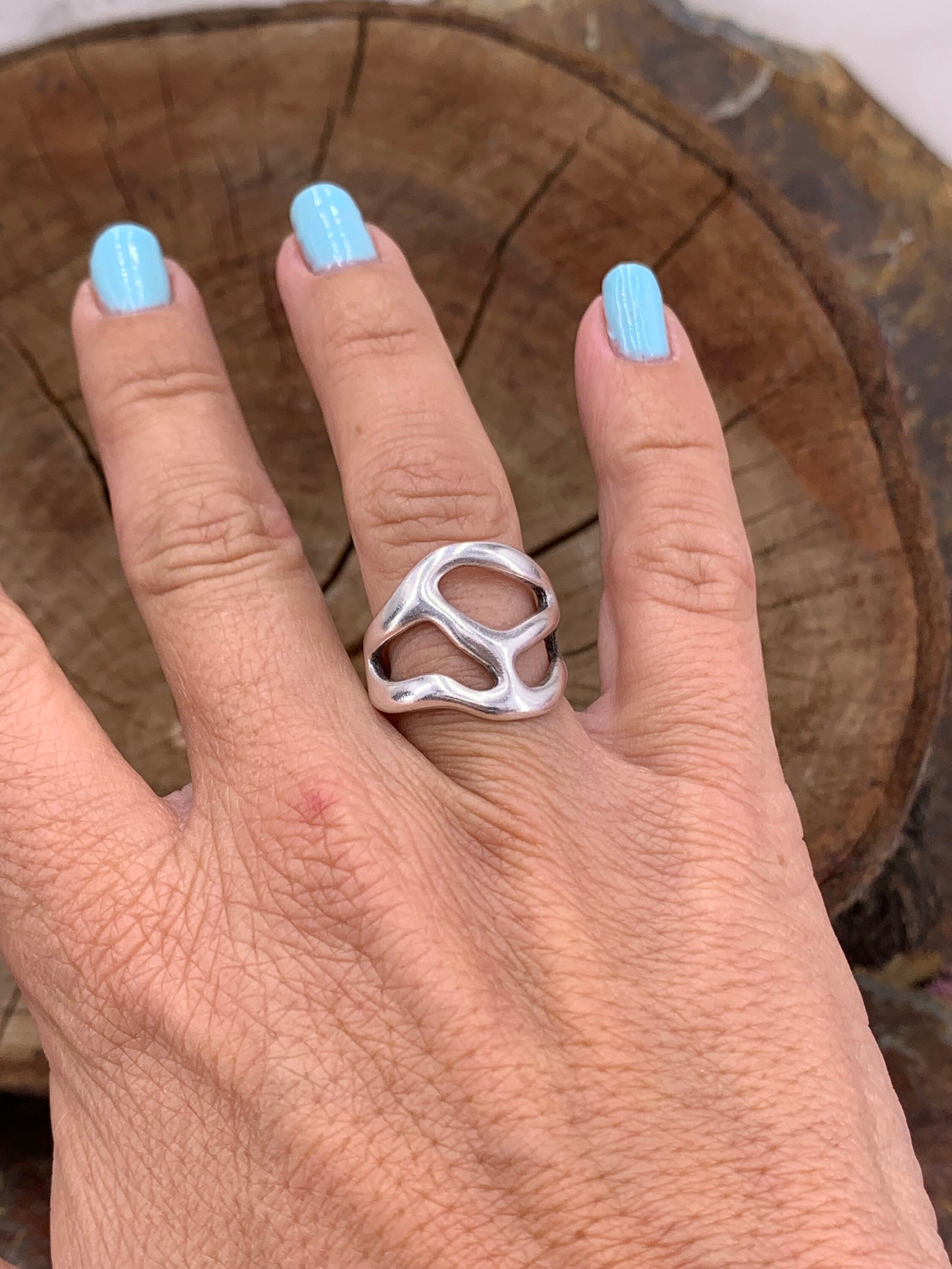 Artisian silver plated carved ring with open band design and bohemian style