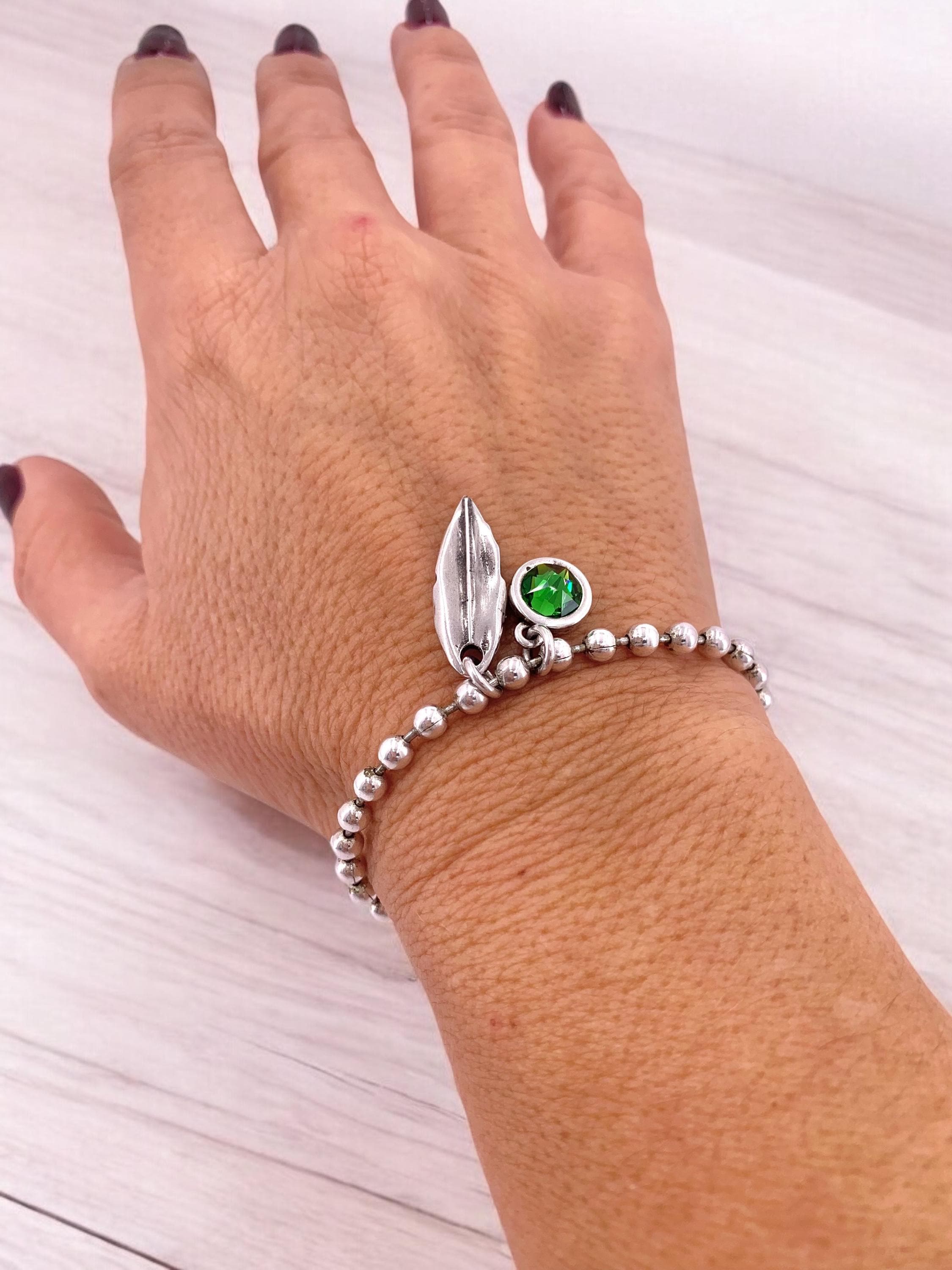 Silver balls chain bracelet with a leaf and Swarovski crystal charm