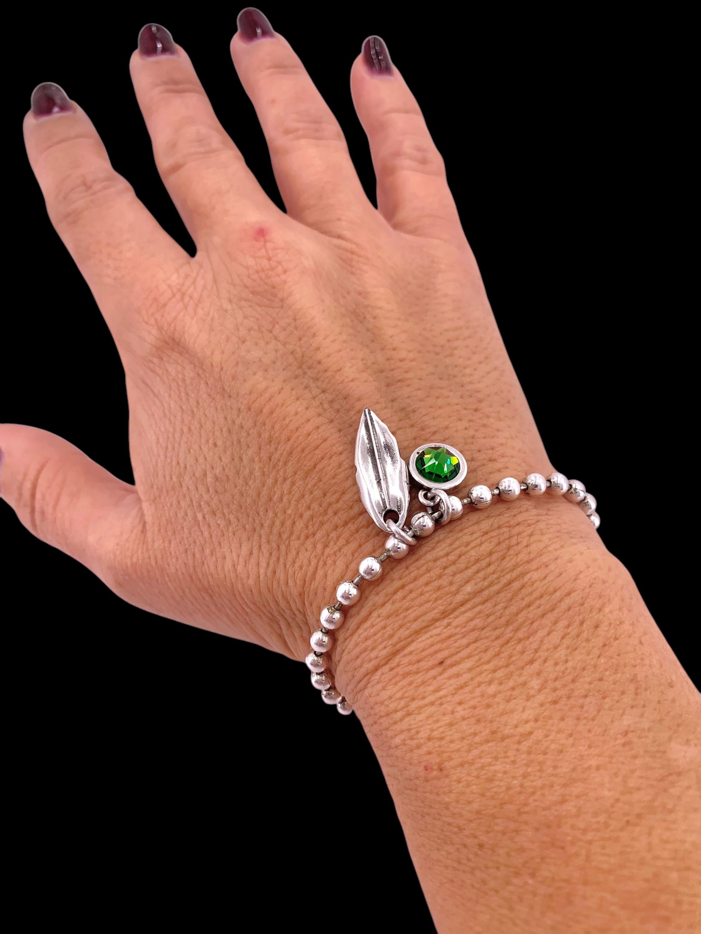 Silver balls chain bracelet with a leaf and Swarovski crystal charm