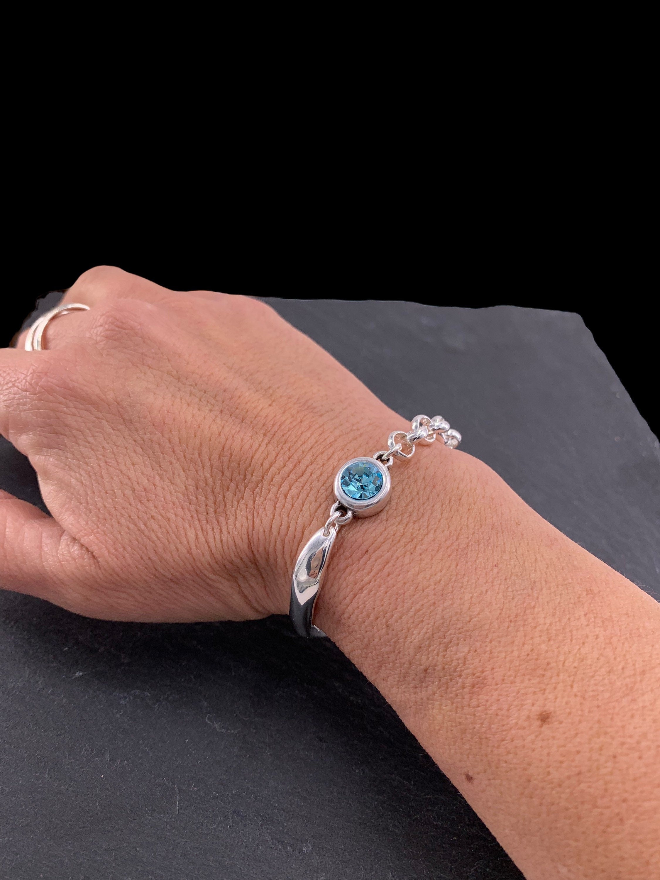 Chunky silver half-cuff and chain bracelet with Swarovski accent, custom bold bracelet