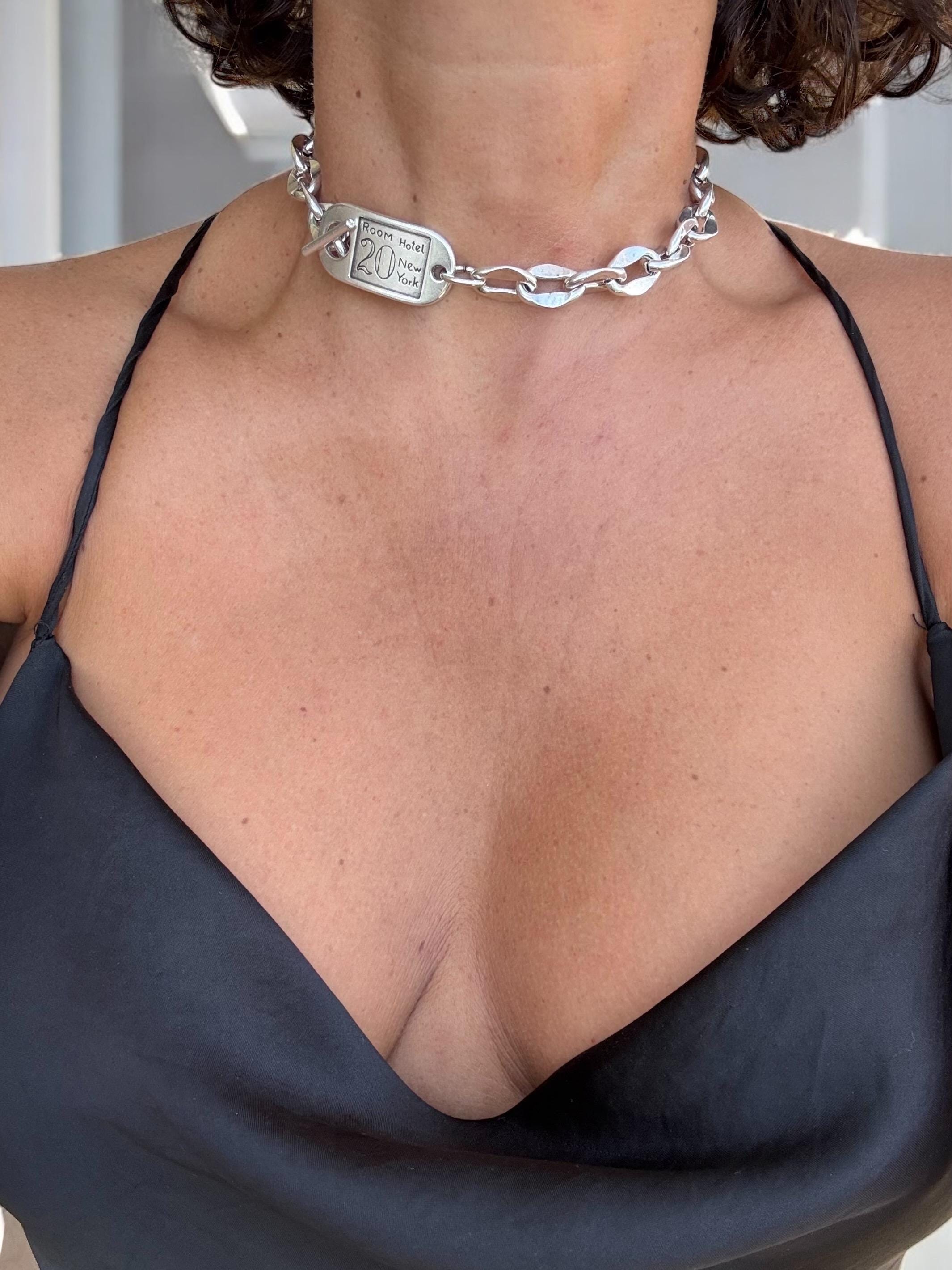 Chunky silver chain necklace with sculpted toggle clasp. Handmade in silver-plated steel. Industrial jewelry