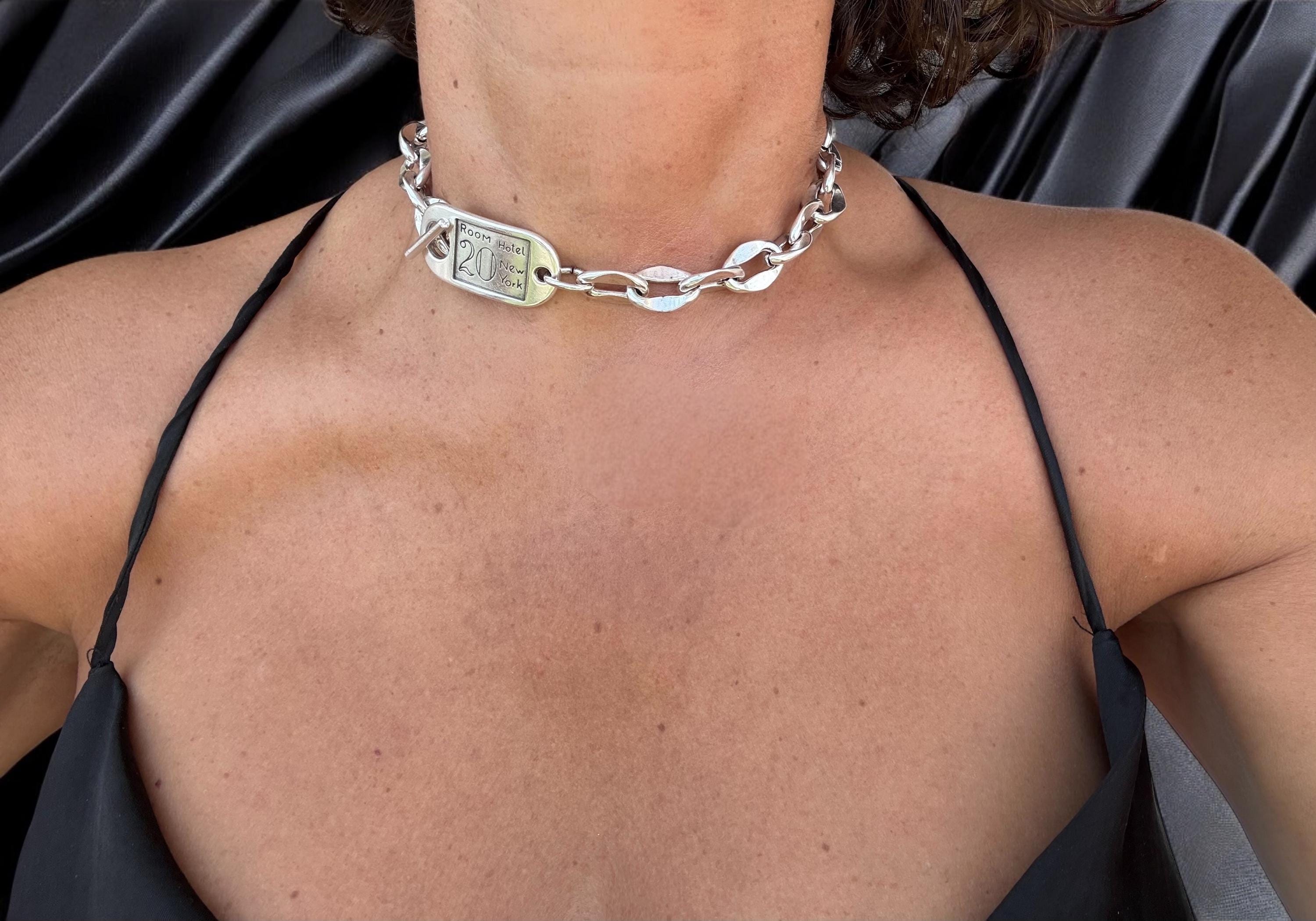 Chunky silver chain necklace with sculpted toggle clasp. Handmade in silver-plated steel. Industrial jewelry