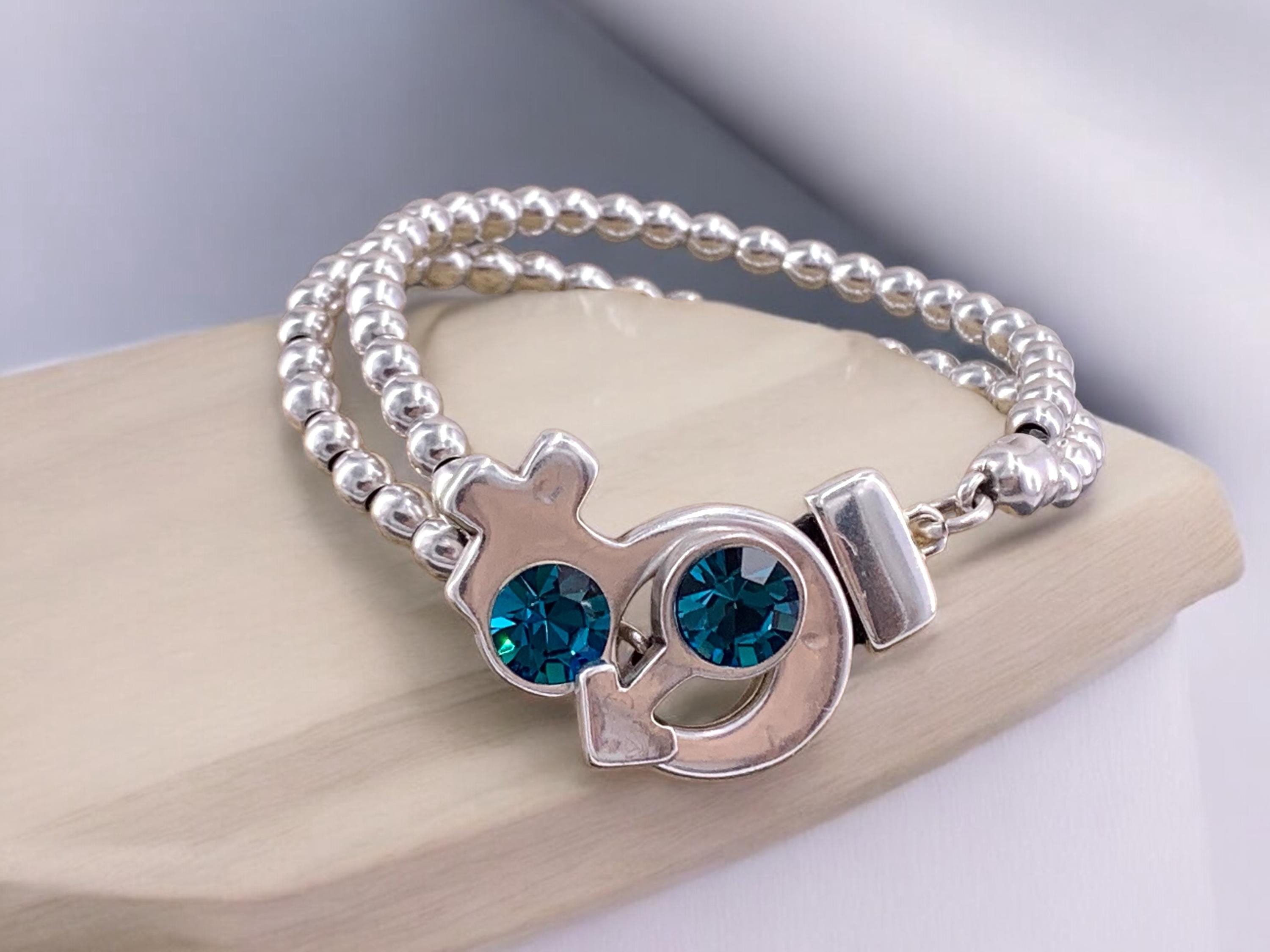 Artisian Chunky silver beaded bracelet with female and male symbol toggle clasp with Swarovski crystals