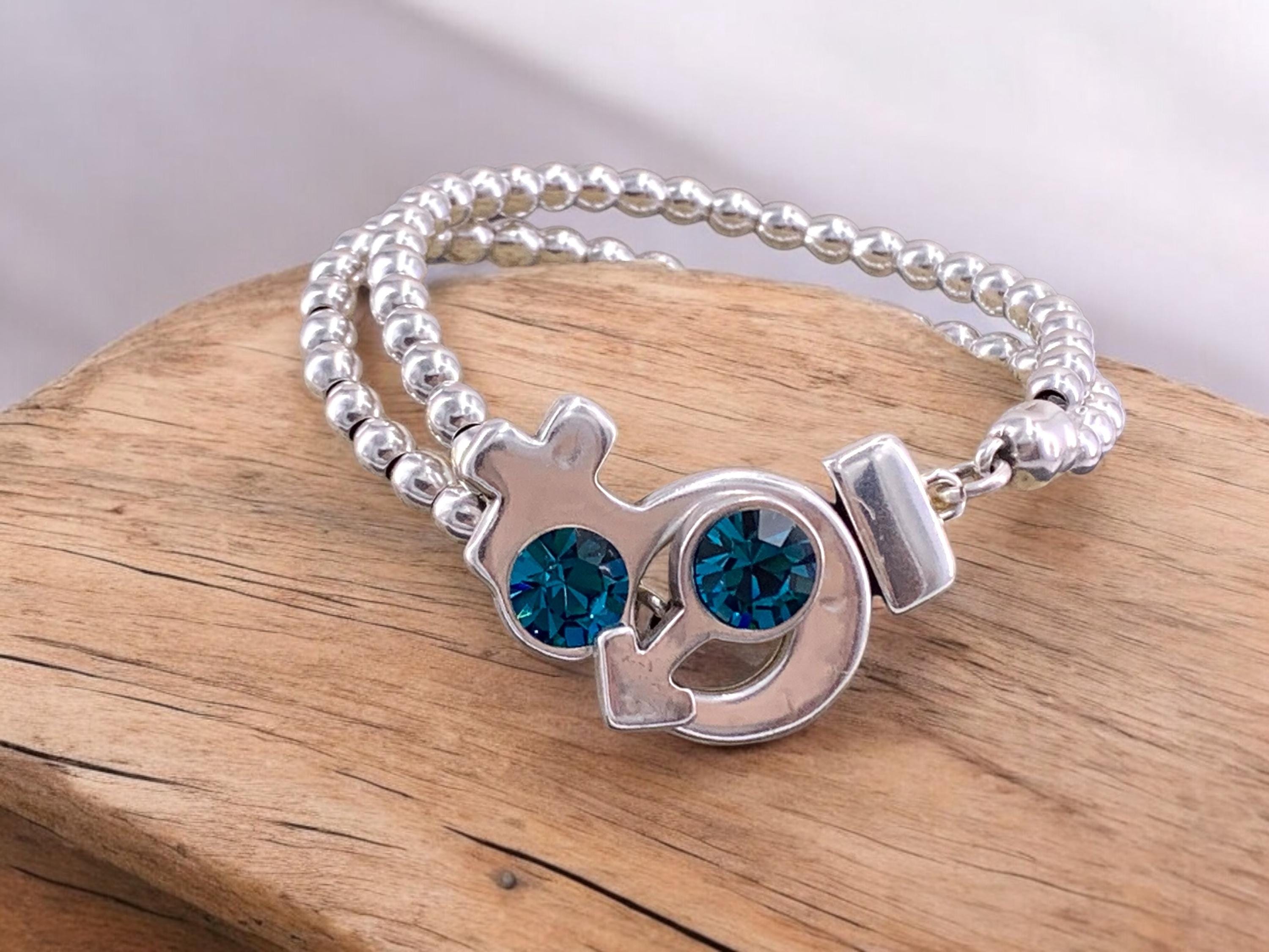 Artisian Chunky silver beaded bracelet with female and male symbol toggle clasp with Swarovski crystals