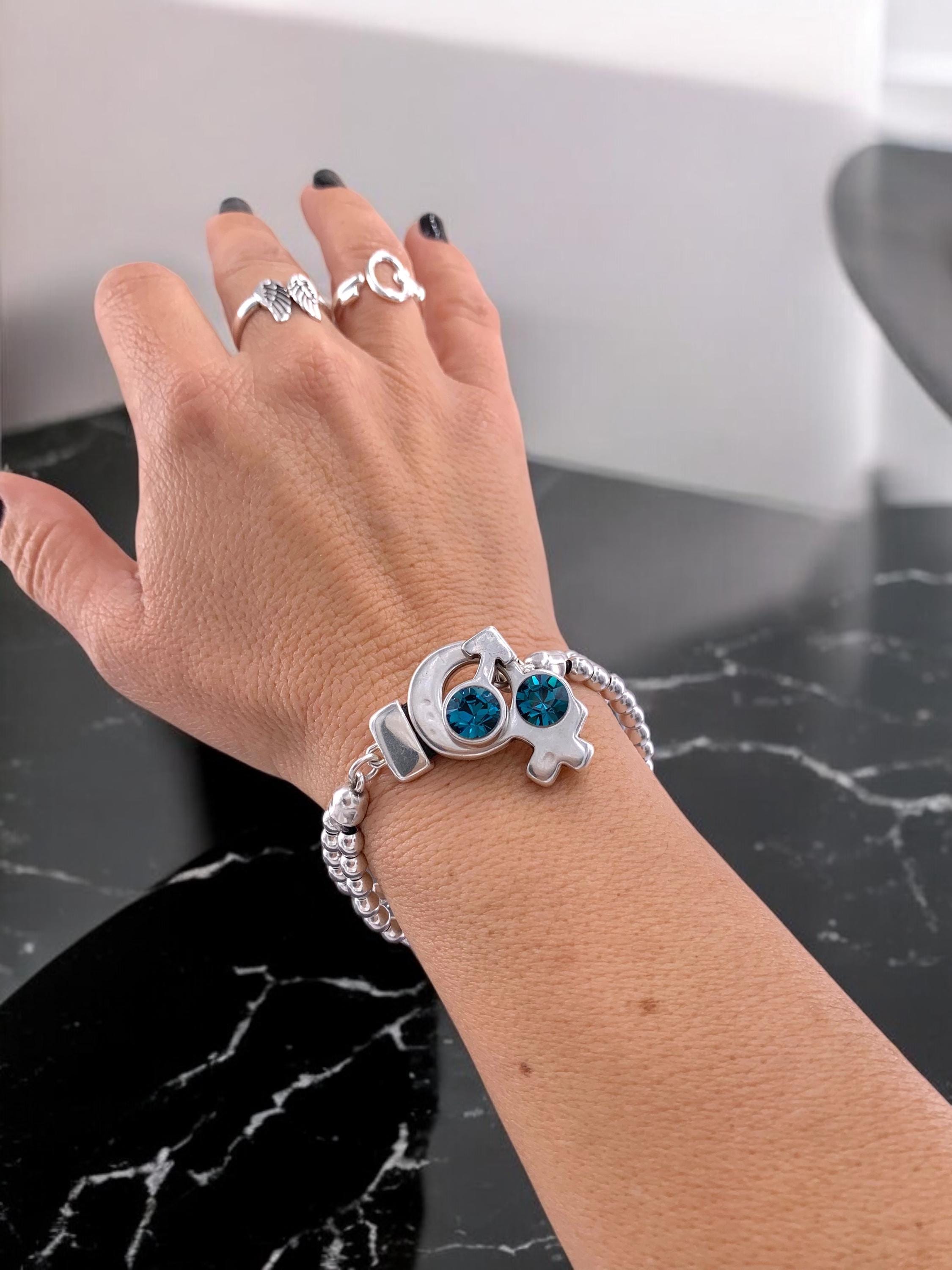 Artisian Chunky silver beaded bracelet with female and male symbol toggle clasp with Swarovski crystals