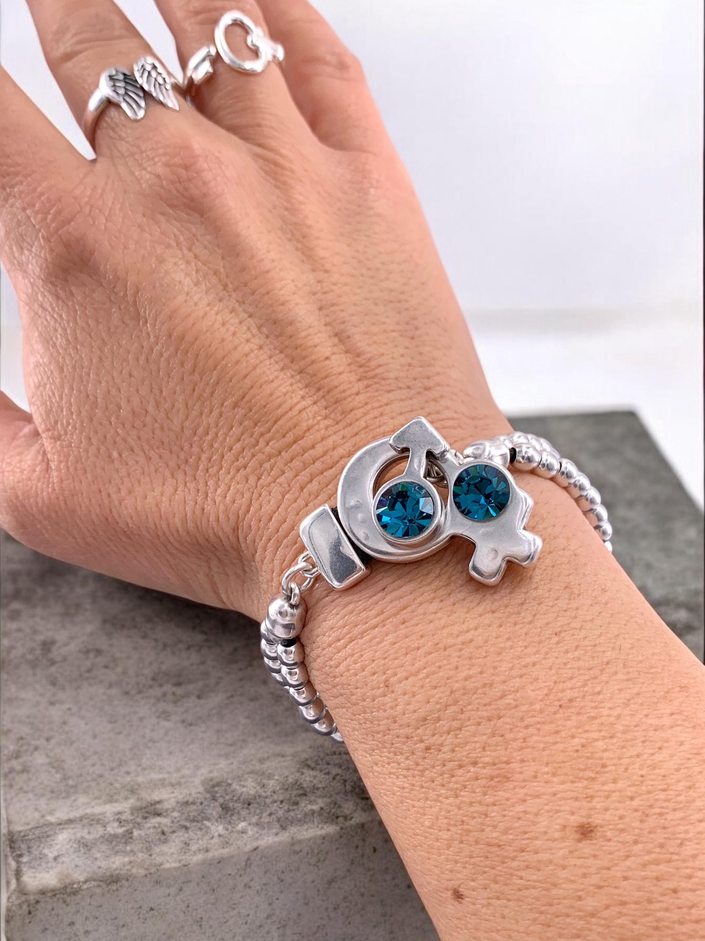 Artisian Chunky silver beaded bracelet with female and male symbol toggle clasp with Swarovski crystals