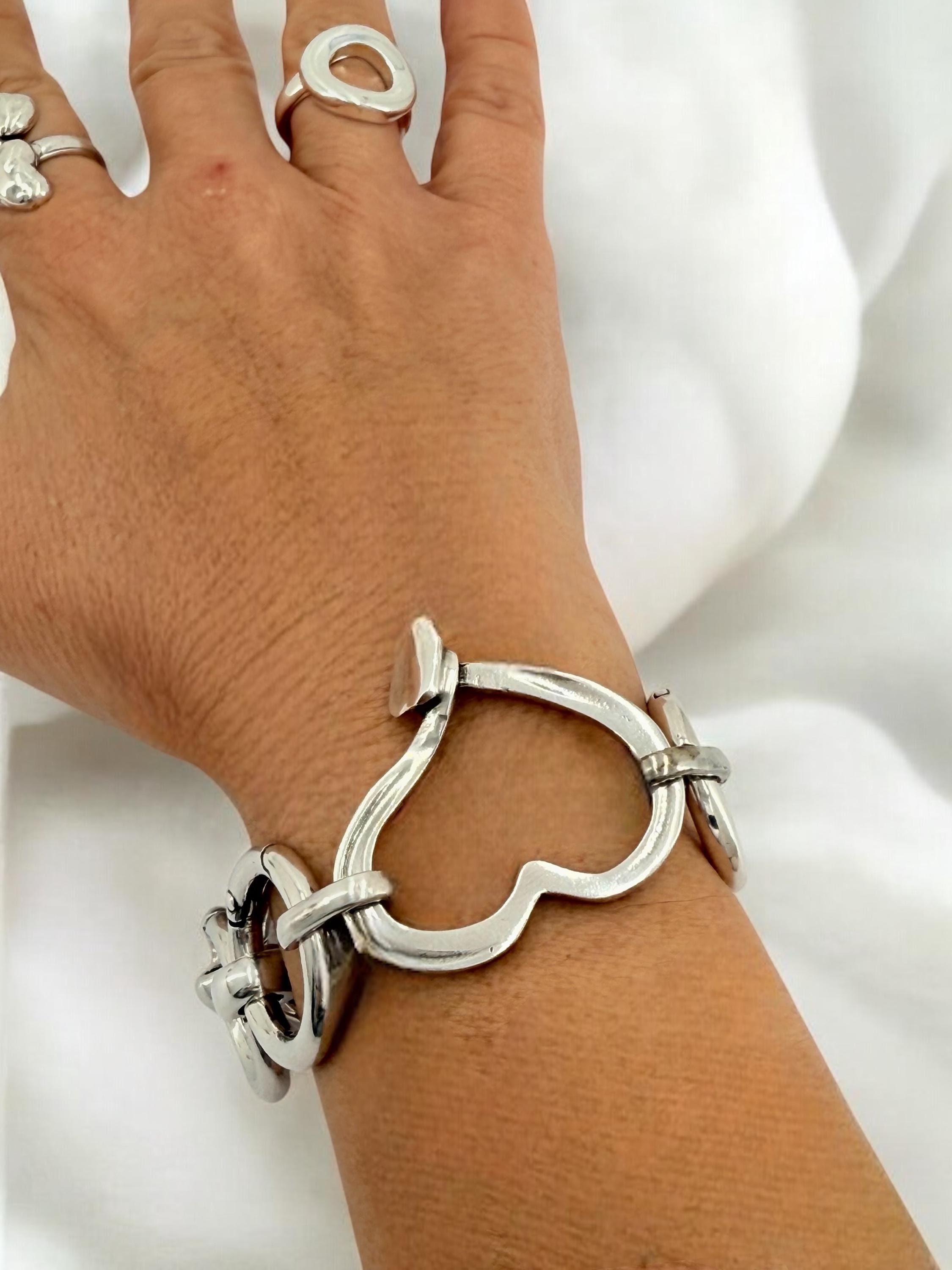 Artisian Circular big links Chunky Silver plated bracelet with statement heart central motive