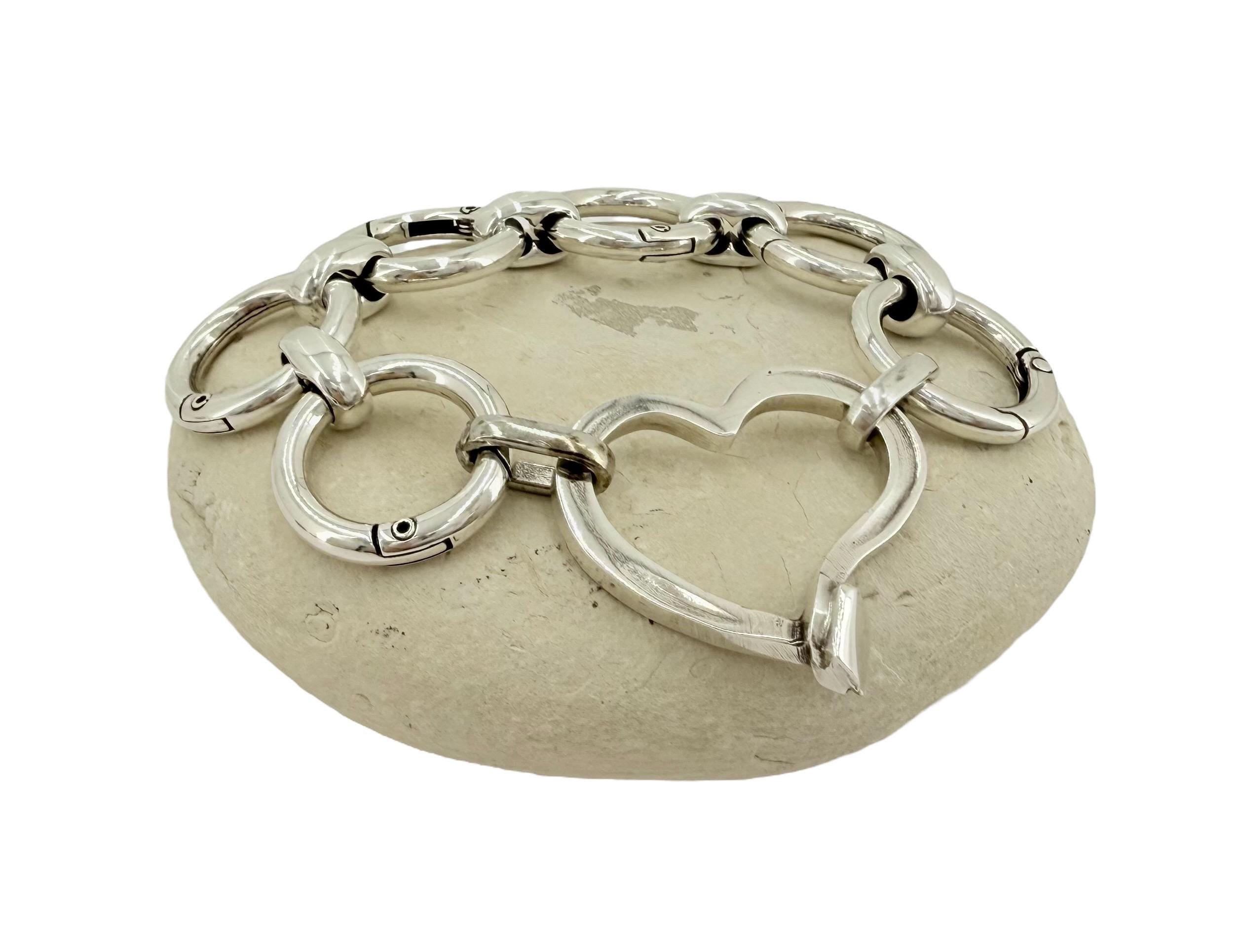 Artisian Circular big links Chunky Silver plated bracelet with statement heart central motive