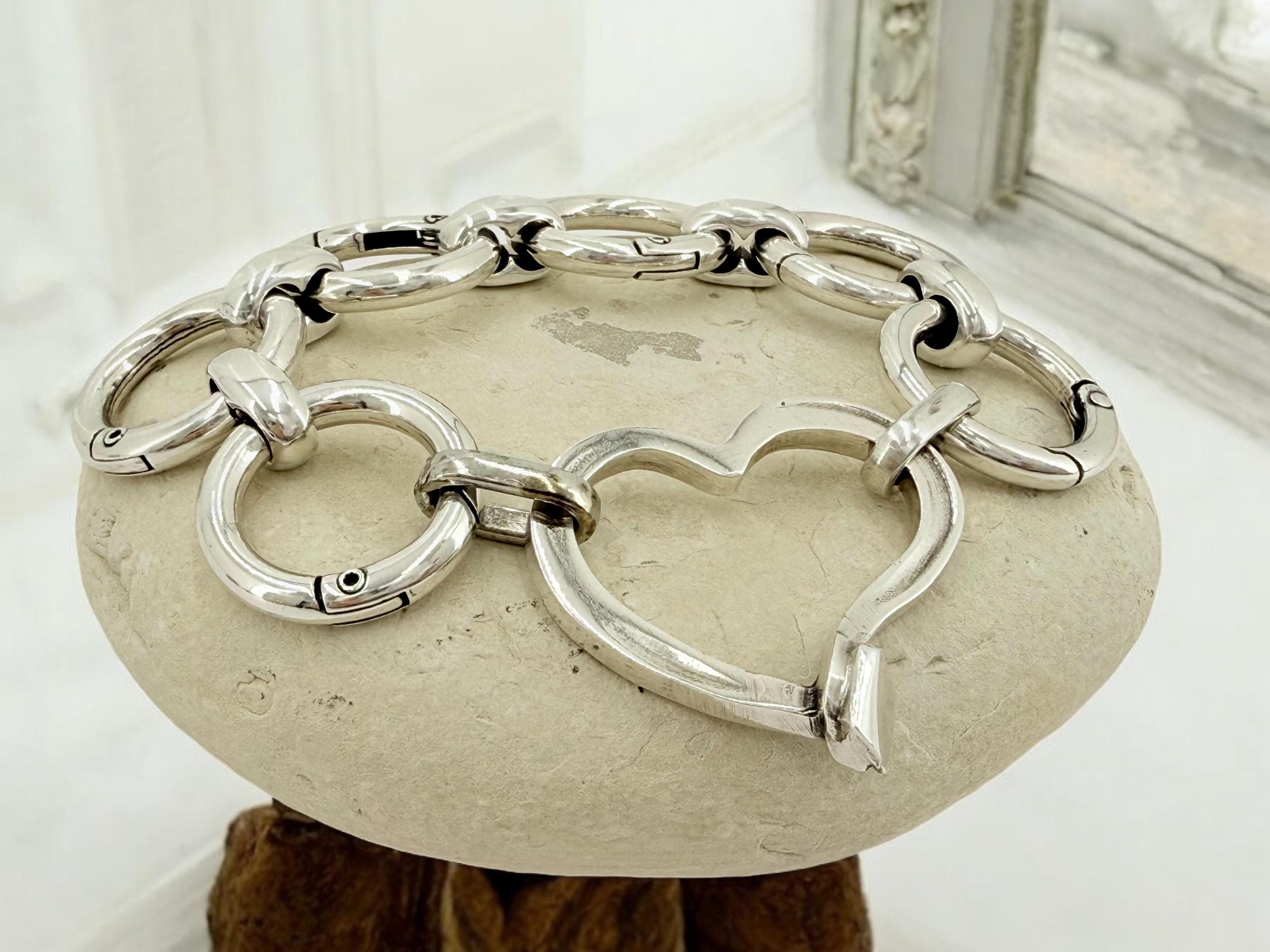 Artisian Circular big links Chunky Silver plated bracelet with statement heart central motive