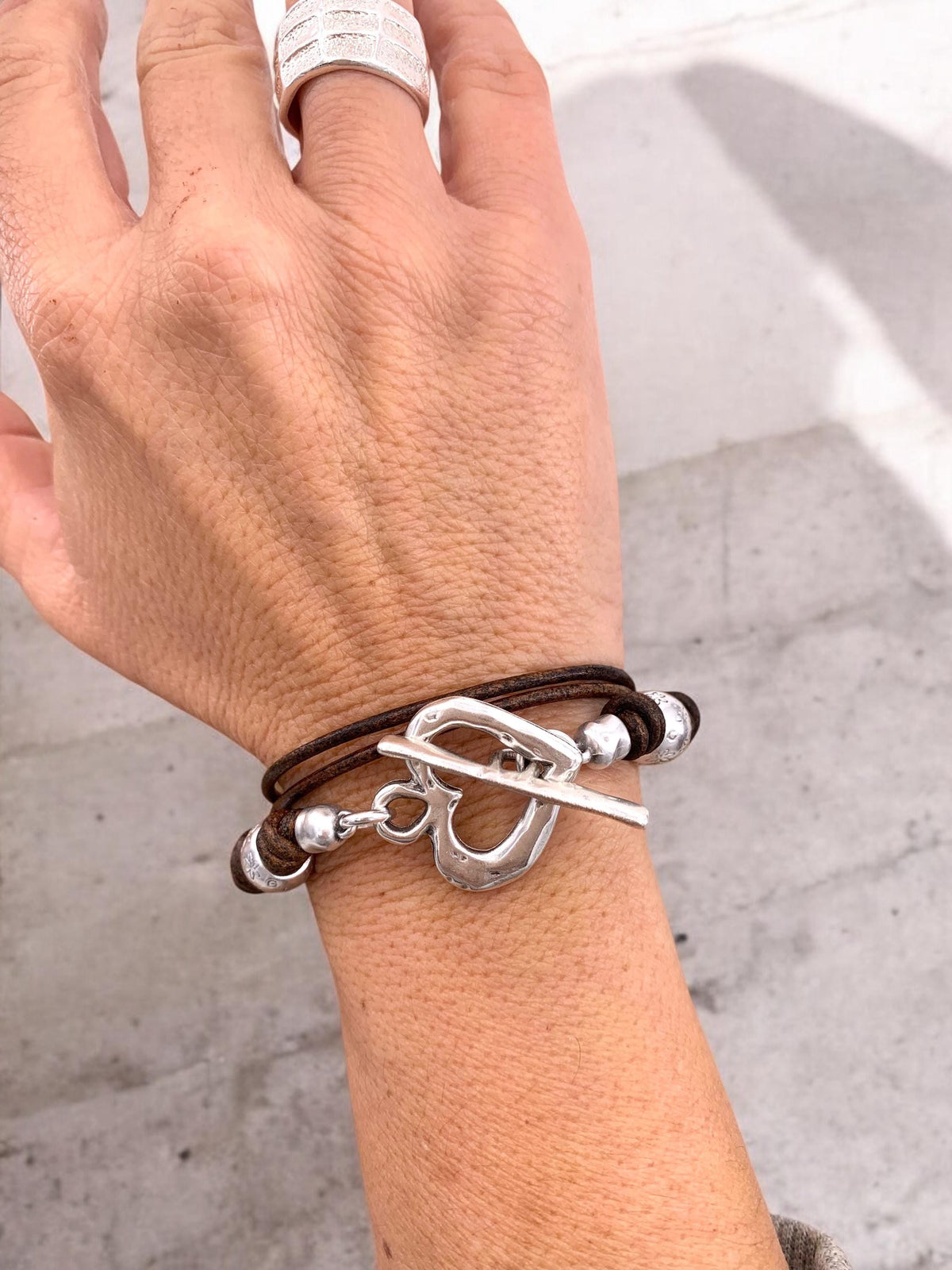 Leather multi strand bracelet with silver heart toggle clasp, handmade customized jewelry