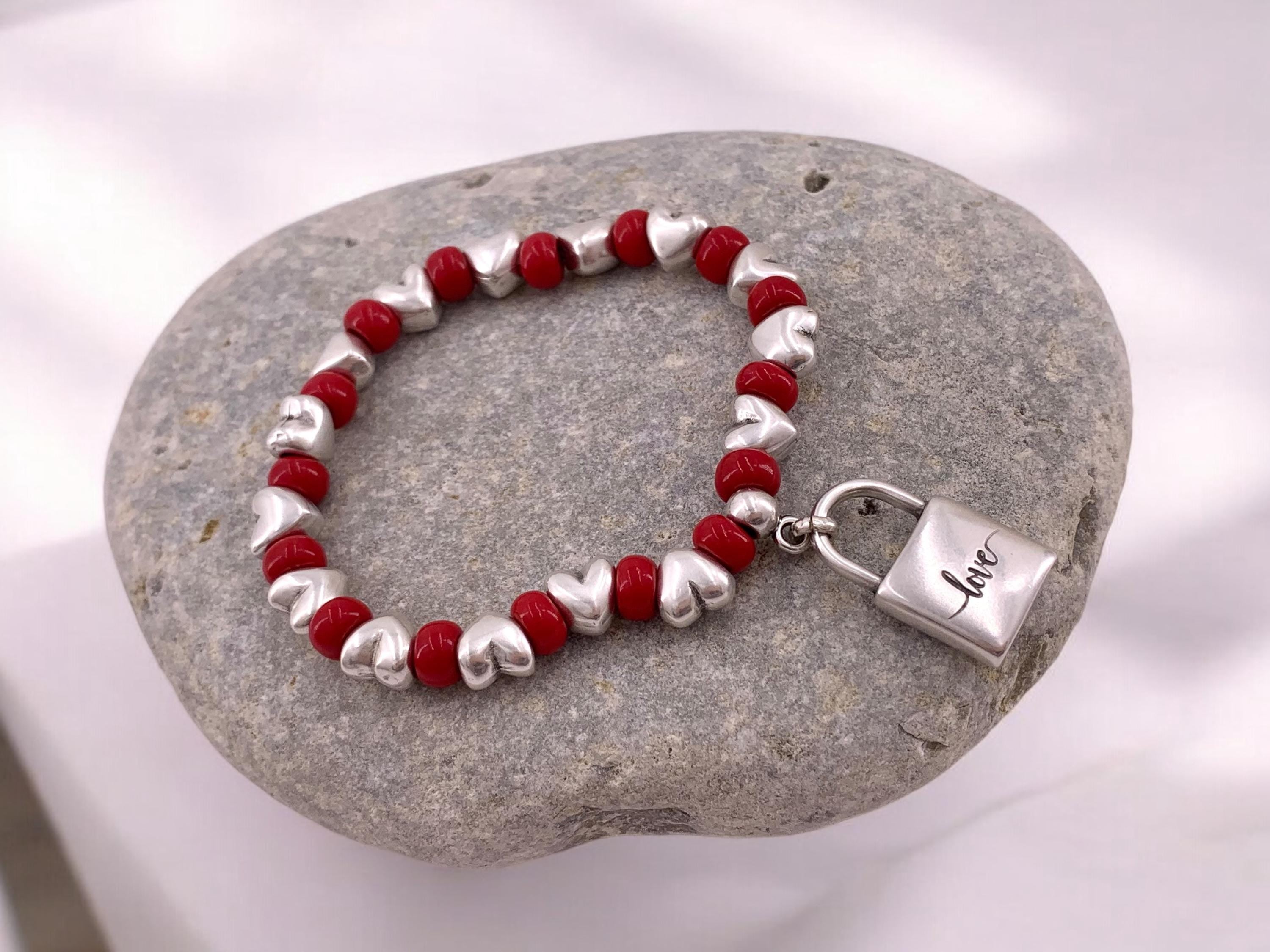 Chunky silver and crystal beads elastic bracelet with padlock pendant