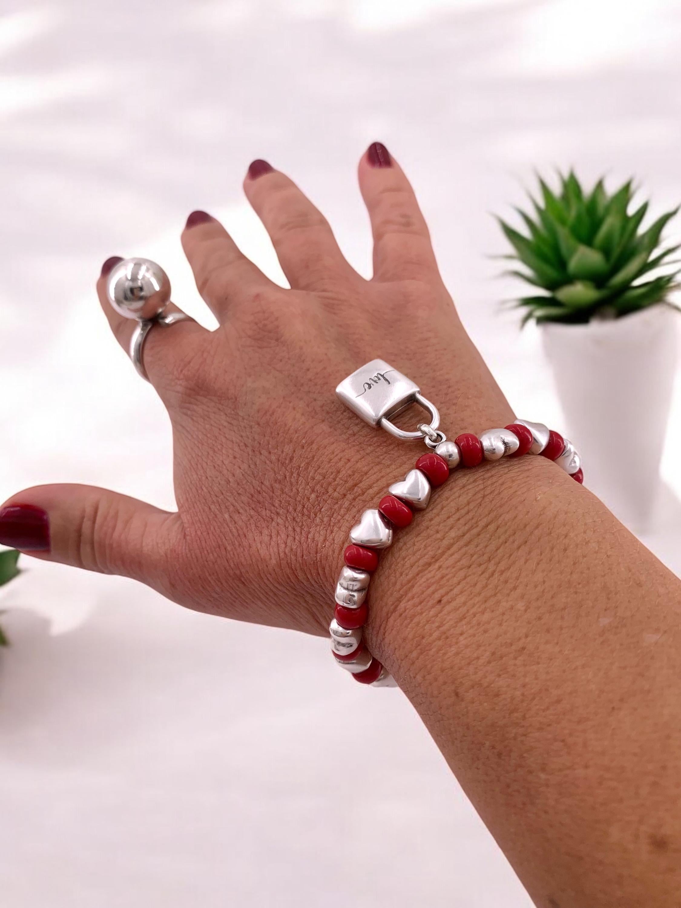 Chunky silver and crystal beads elastic bracelet with padlock pendant