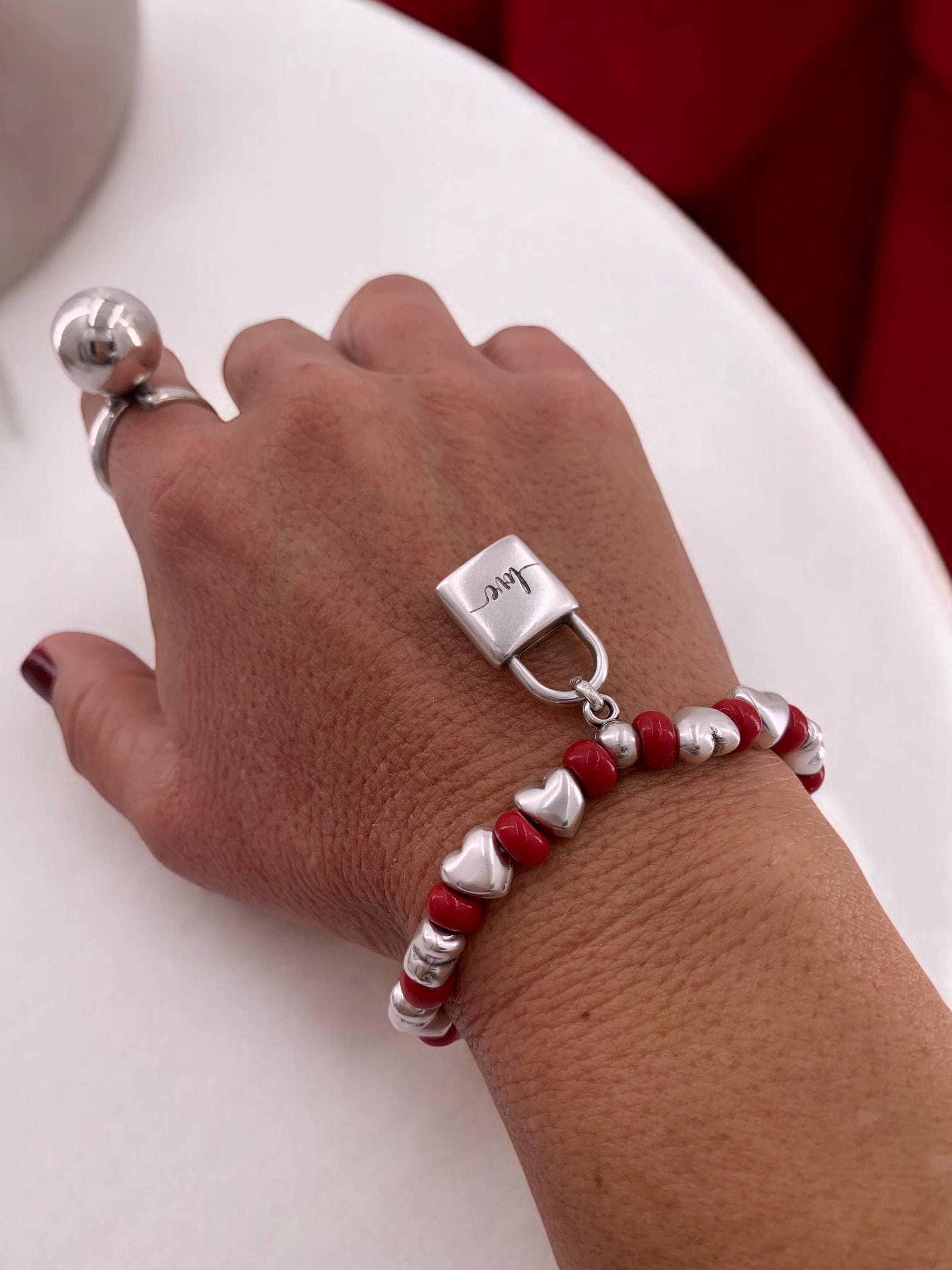 Chunky silver and crystal beads elastic bracelet with padlock pendant