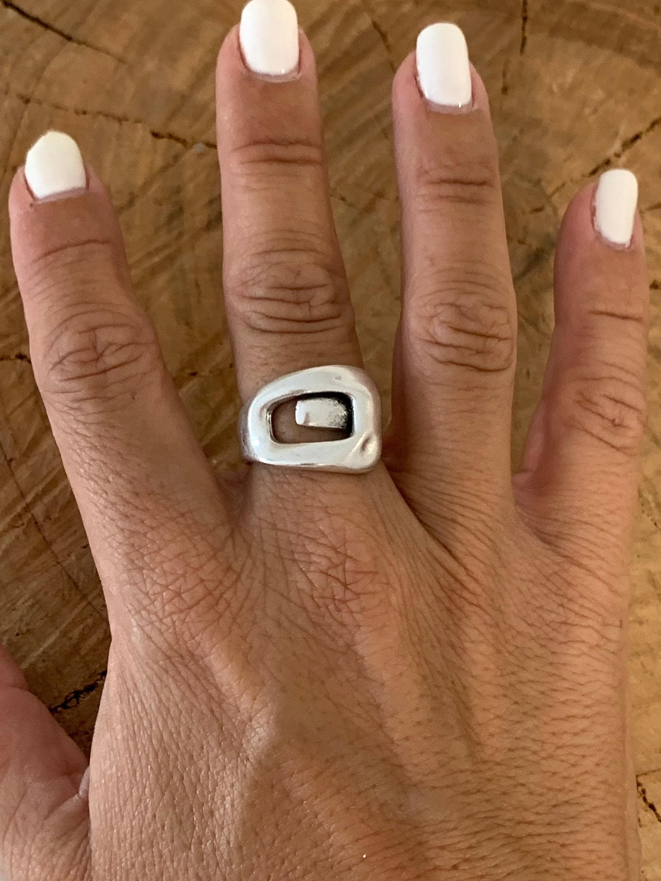 Bold, chunky, silver adjustable ring—perfect for birthdays. statement jewelry, a stylish silver gift for a friend or mom. on trend