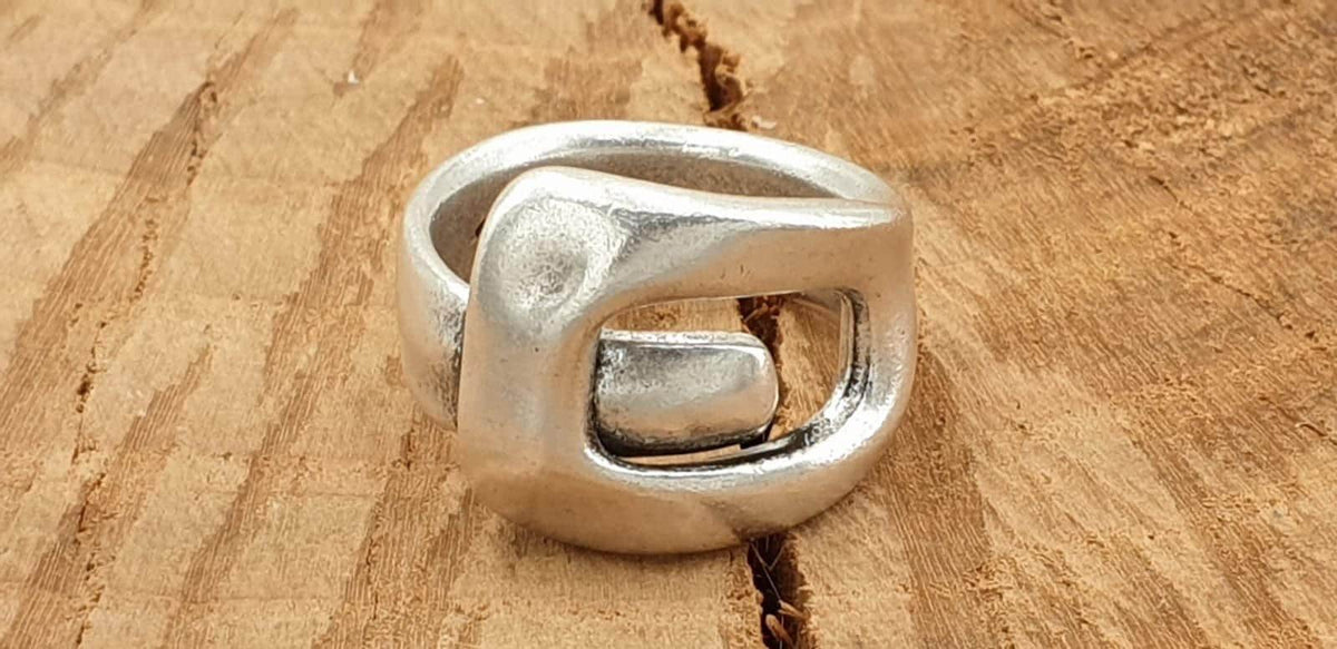 Bold, chunky, silver adjustable ring—perfect for birthdays. statement jewelry, a stylish silver gift for a friend or mom. on trend