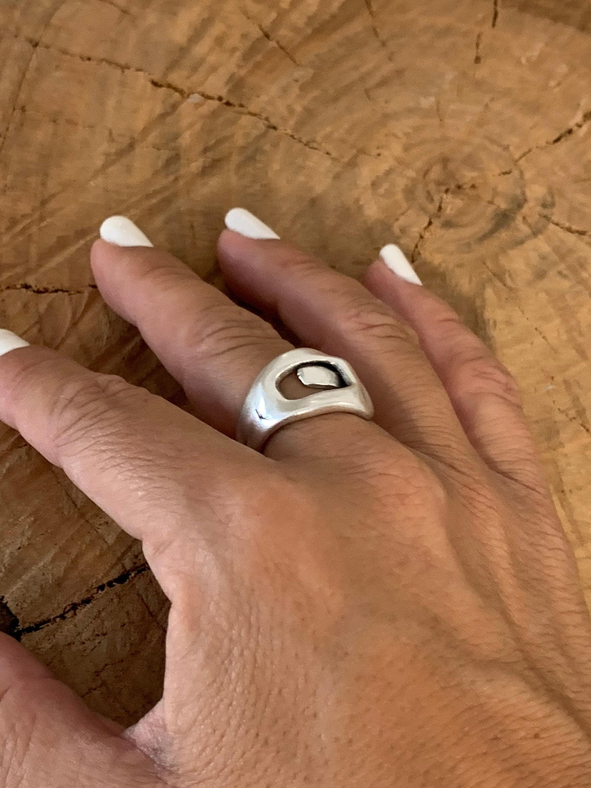 Bold, chunky, silver adjustable ring—perfect for birthdays. statement jewelry, a stylish silver gift for a friend or mom. on trend