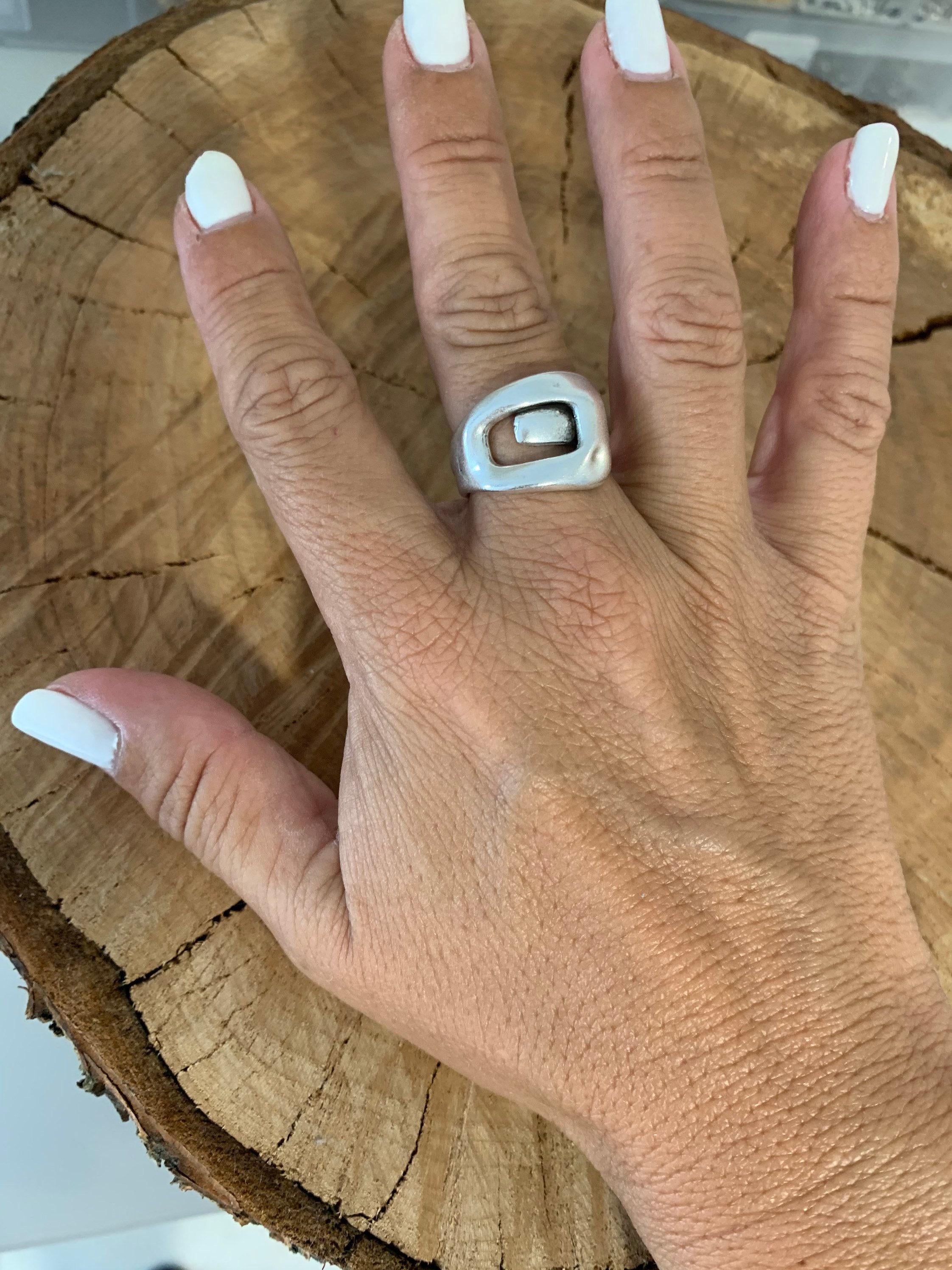 Bold, chunky, silver adjustable ring—perfect for birthdays. statement jewelry, a stylish silver gift for a friend or mom. on trend