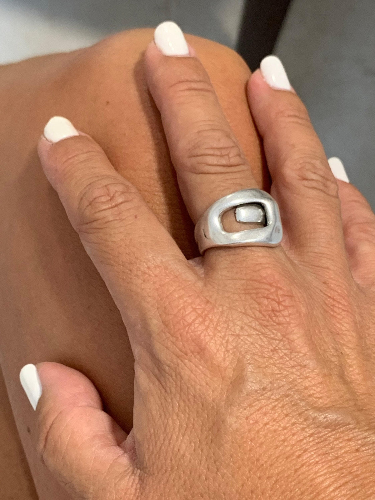 Bold, chunky, silver adjustable ring—perfect for birthdays. statement jewelry, a stylish silver gift for a friend or mom. on trend