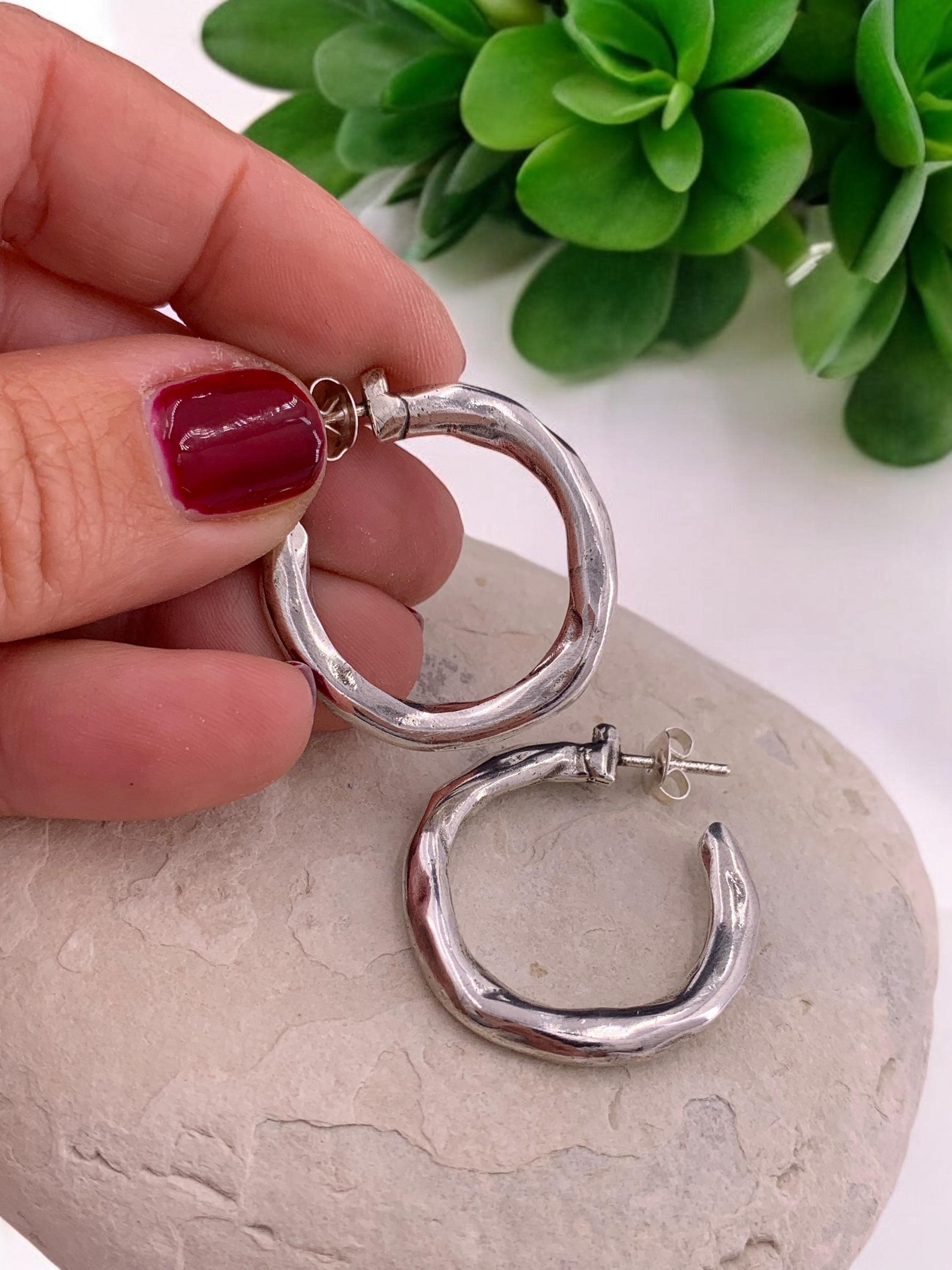 Hammered chunky silver hoop earrings with engraved texture, bold design, large size
