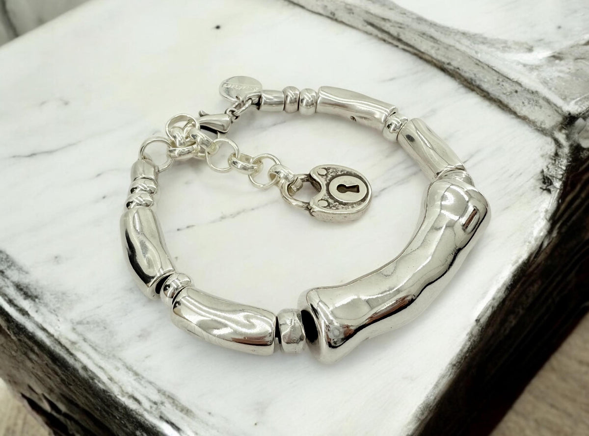 Silver thick tube chunky bracelet, bold adjustable  cuff, sculptural design