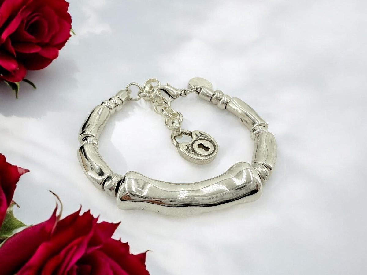 Silver thick tube chunky bracelet, bold adjustable  cuff, sculptural design
