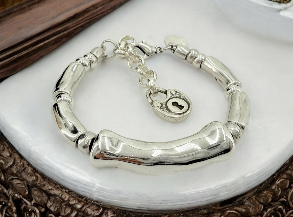 Silver thick tube chunky bracelet, bold adjustable  cuff, sculptural design