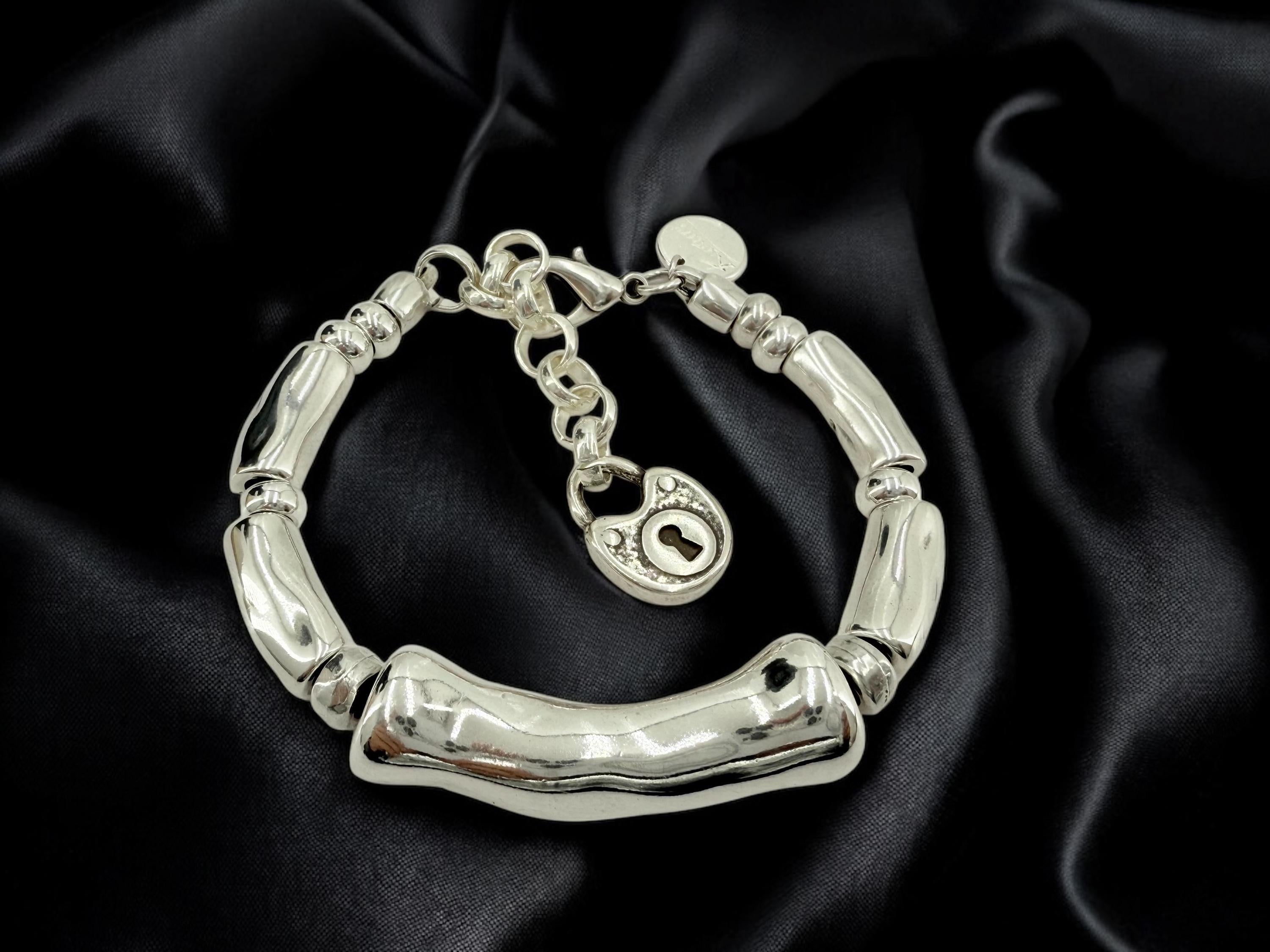 Silver thick tube chunky bracelet, bold adjustable  cuff, sculptural design